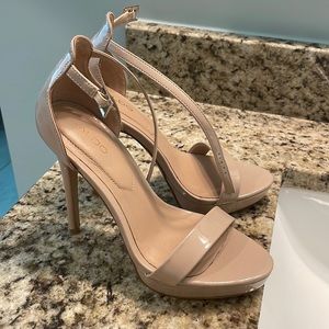 Stiletto nude shines strap heels